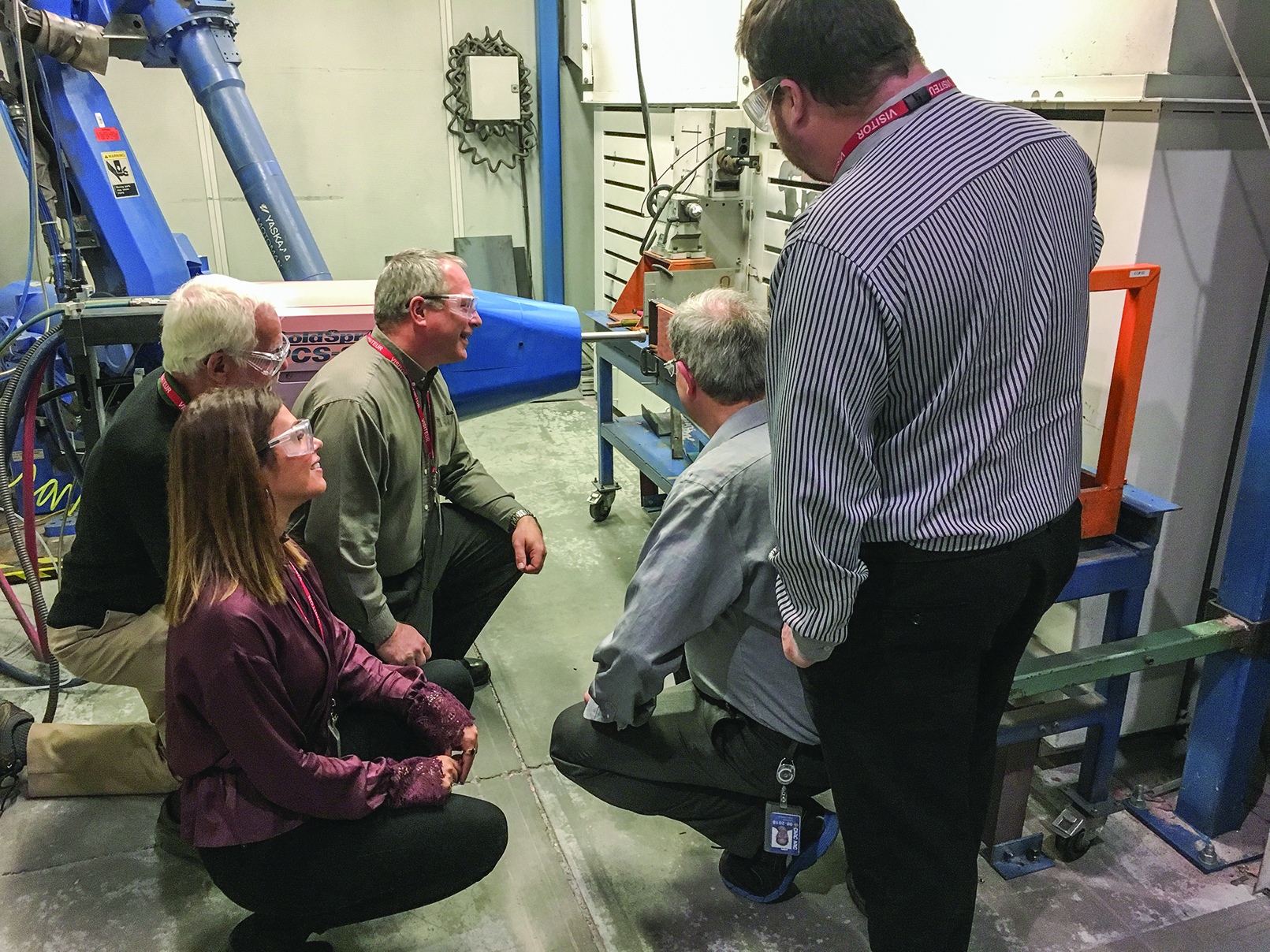 Scientists from the NWMO and Western University visit a national research facility where coatings are made and applied to prototype used fuel containers.